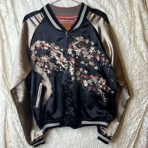 Reversible embroidered bomber jacket.